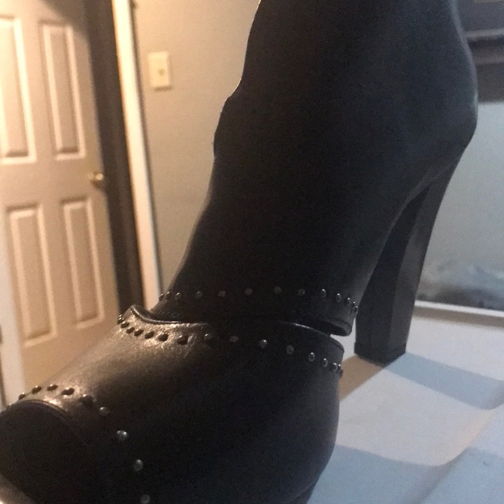 Black Leather Heeled Booties with Nail head design around Toe and footNever Worn